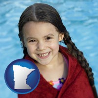 minnesota map icon and a little girl wrapped in a dark red towel, in front of a swimming pool