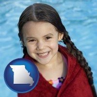 missouri map icon and a little girl wrapped in a dark red towel, in front of a swimming pool