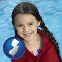 new-jersey map icon and a little girl wrapped in a dark red towel, in front of a swimming pool