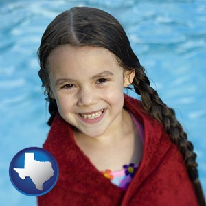 a little girl wrapped in a dark red towel, in front of a swimming pool - with Texas icon